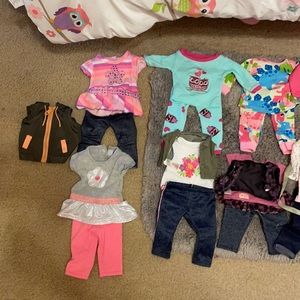 Lote of clothes fits 14 inch dolls..